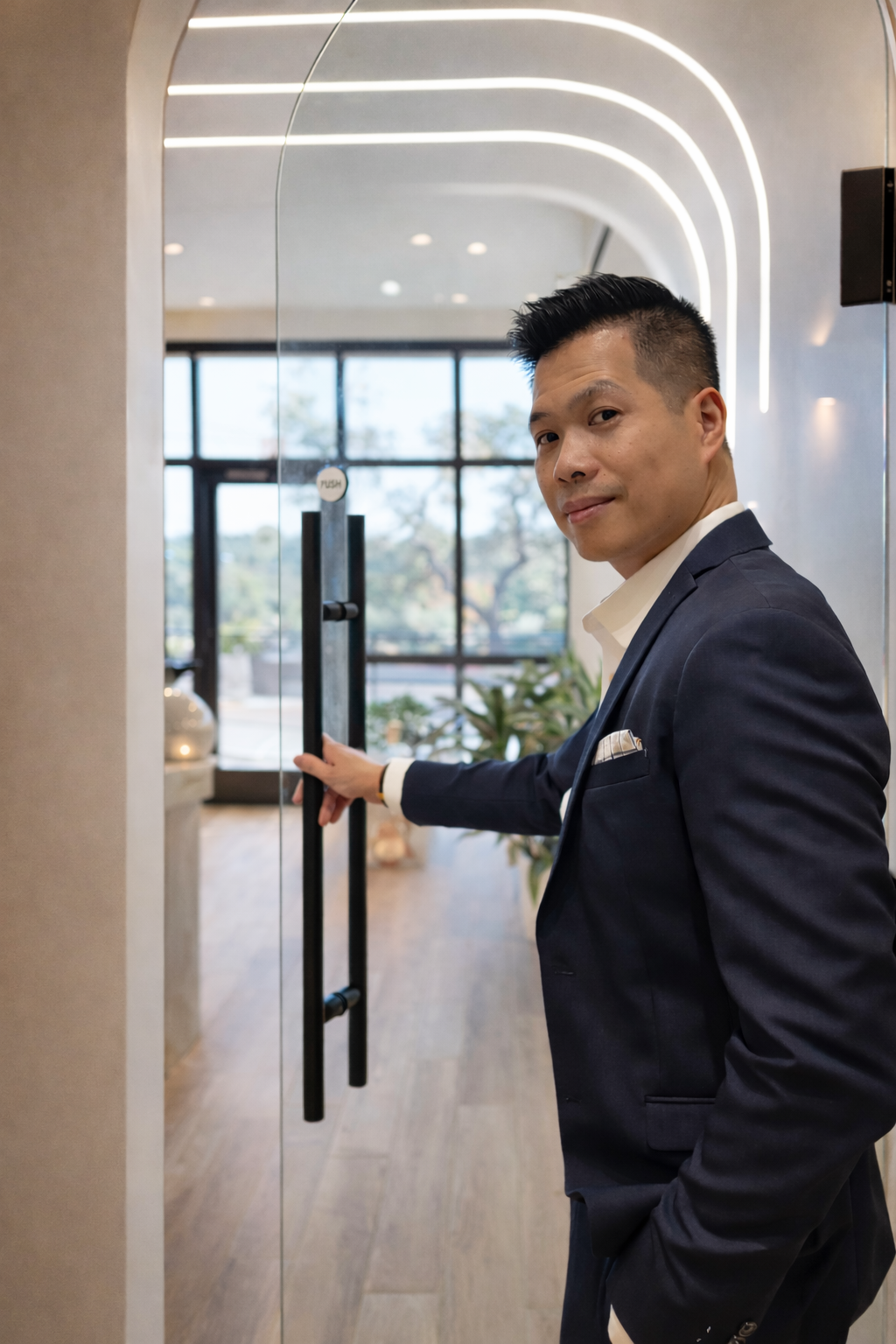 Dr. Robert Banh welcoming patients at Rise Dental